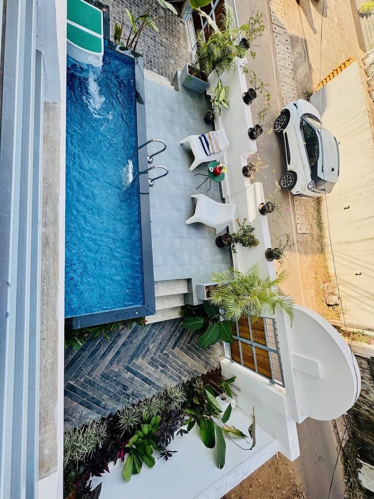 Family Quadruple Room, Balcony, Pool View — photo 1